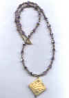 boneSQ_PurpMetCrystal20.jpg (45440 bytes)